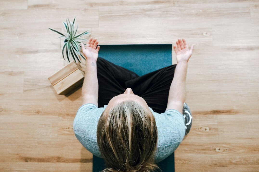 person meditating peacefully