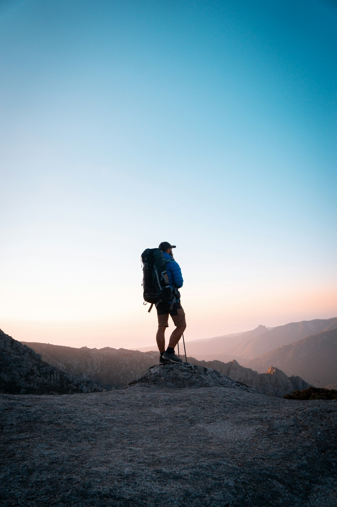 person hiking at sunrise