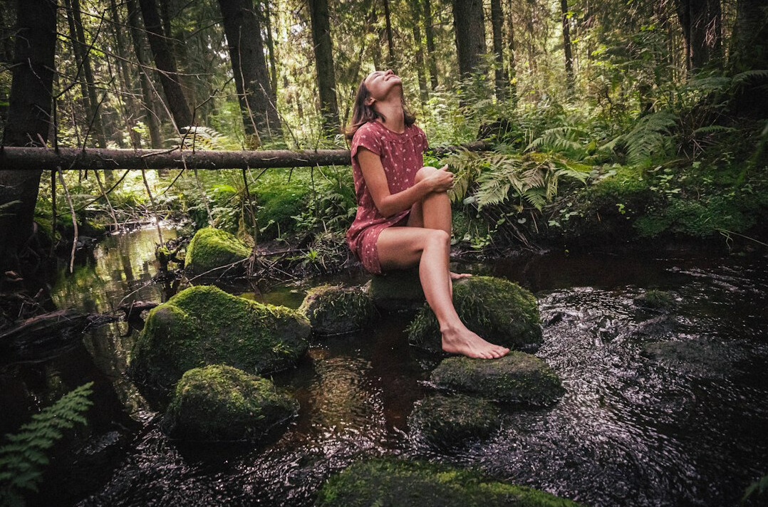 person reflecting in nature